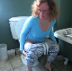 A blonde woman is recorded taking her morning shit and piss. The turd is absolutely massive and long. More keeps coming out. Finished product shown in toilet bowl, too!  Presented in 720P HD. About 7 minutes.